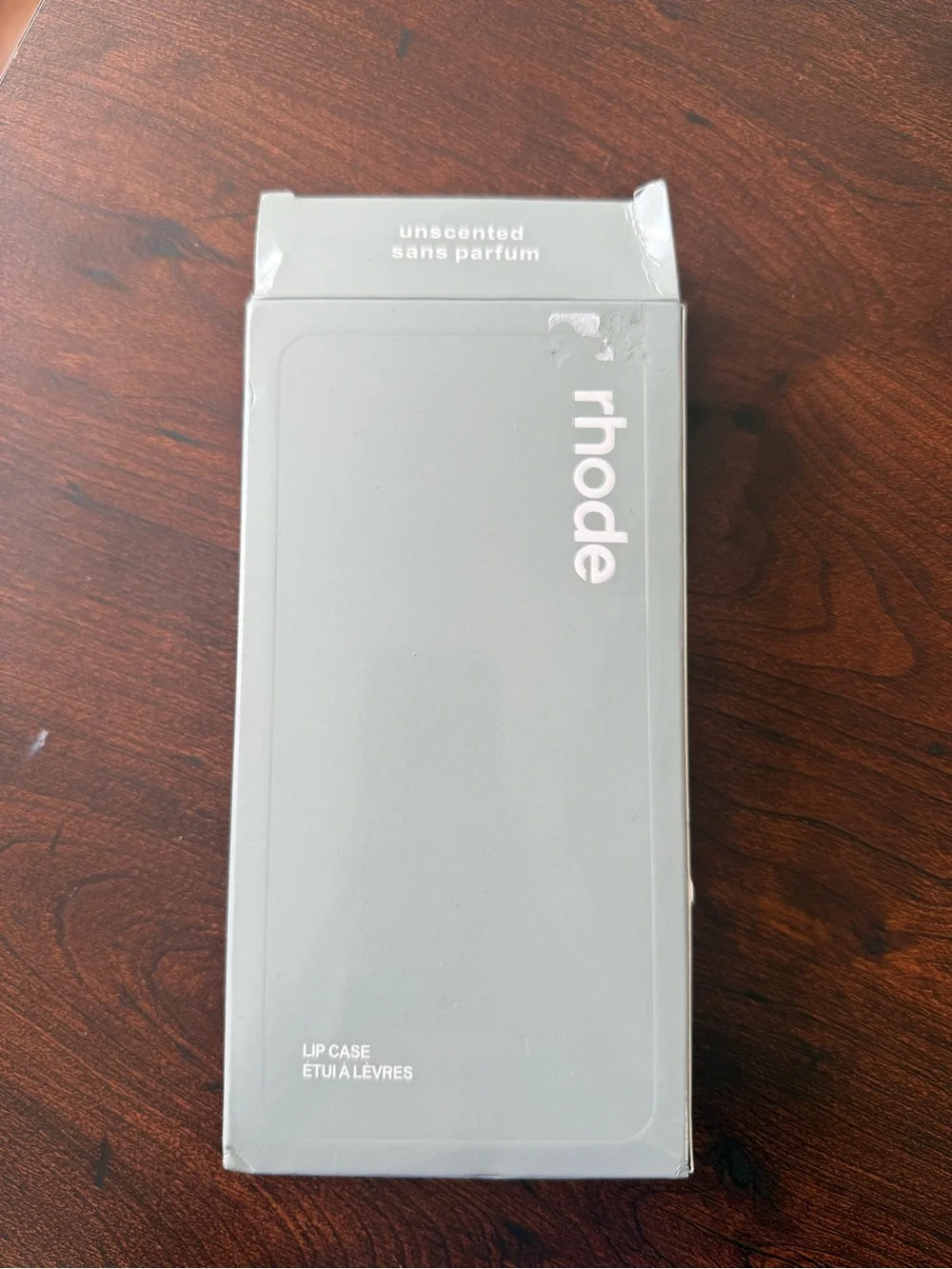RHODE Cream Soft Silicone iPhone Case with Integrated Strap